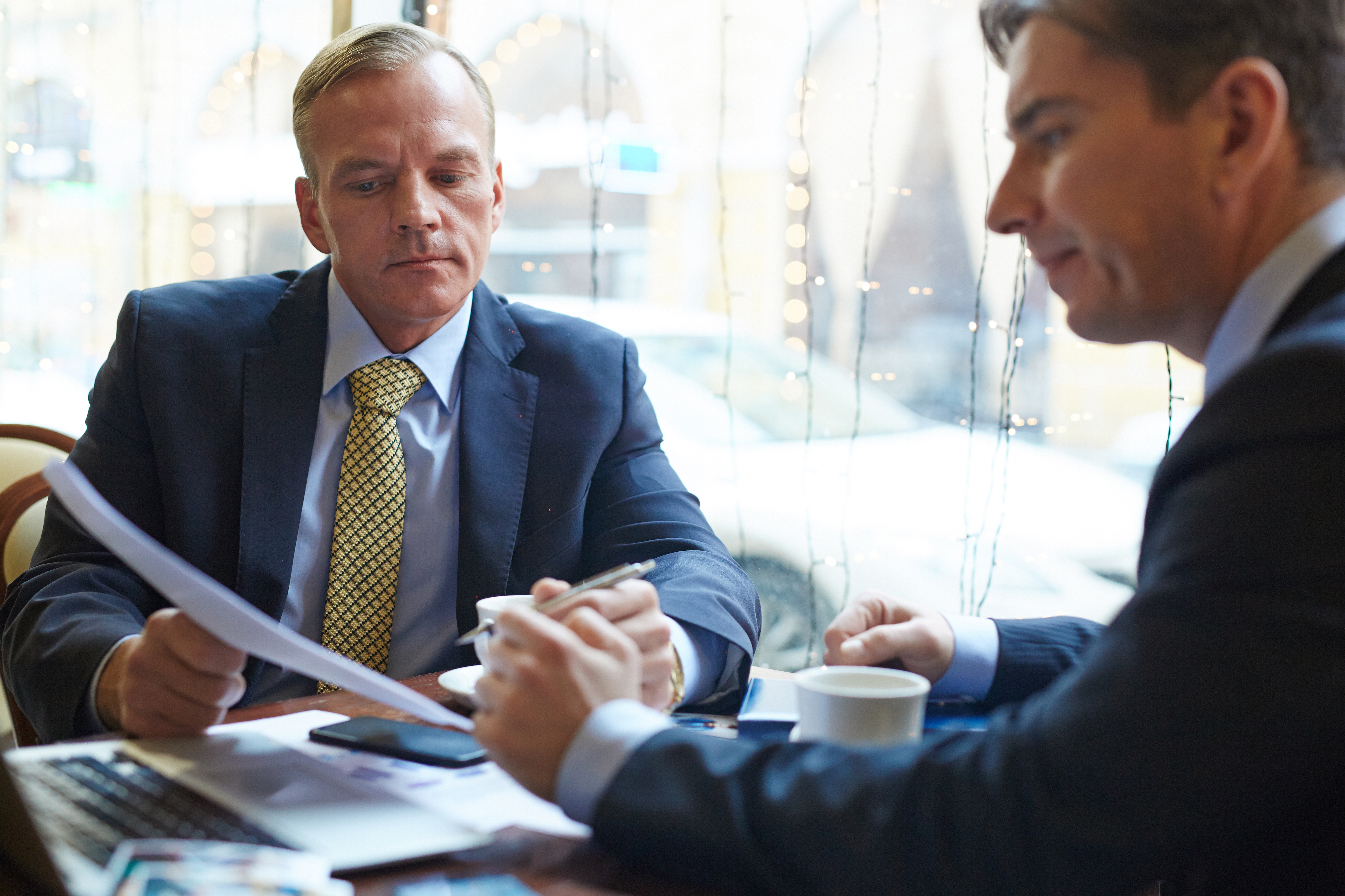 Business owner reviewing paperwork