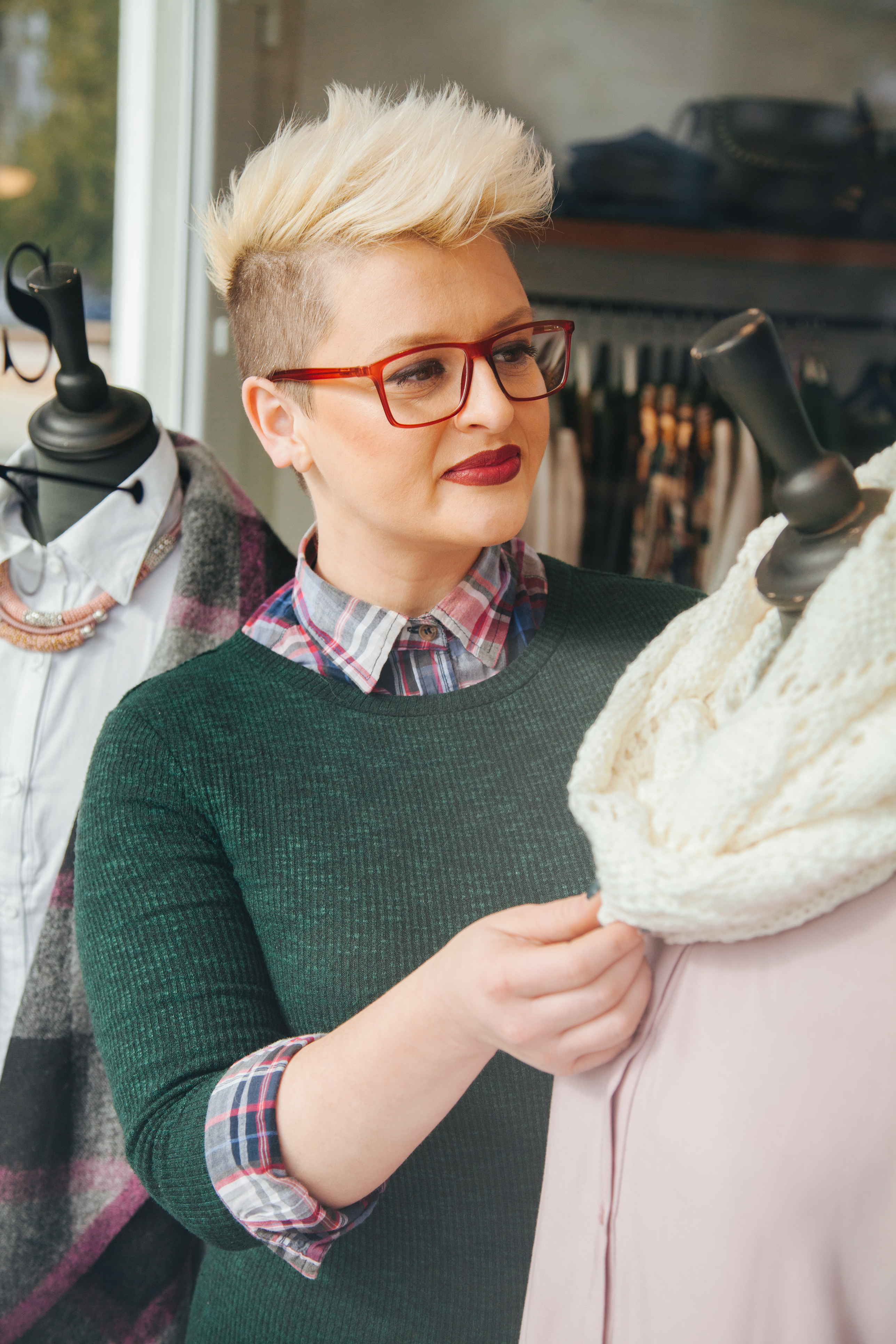 Clothing designer looking at an outfit